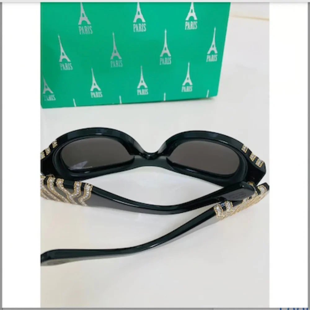 Balenciaga Black sunglasses studded with gold hardware and crystals - Picture 10 of 11